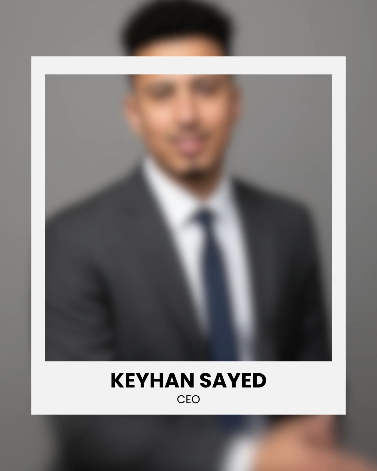 Framed portrait of Keyhan Sayed, CEO of Sayed Transport, Canadian trucking company, blurred background