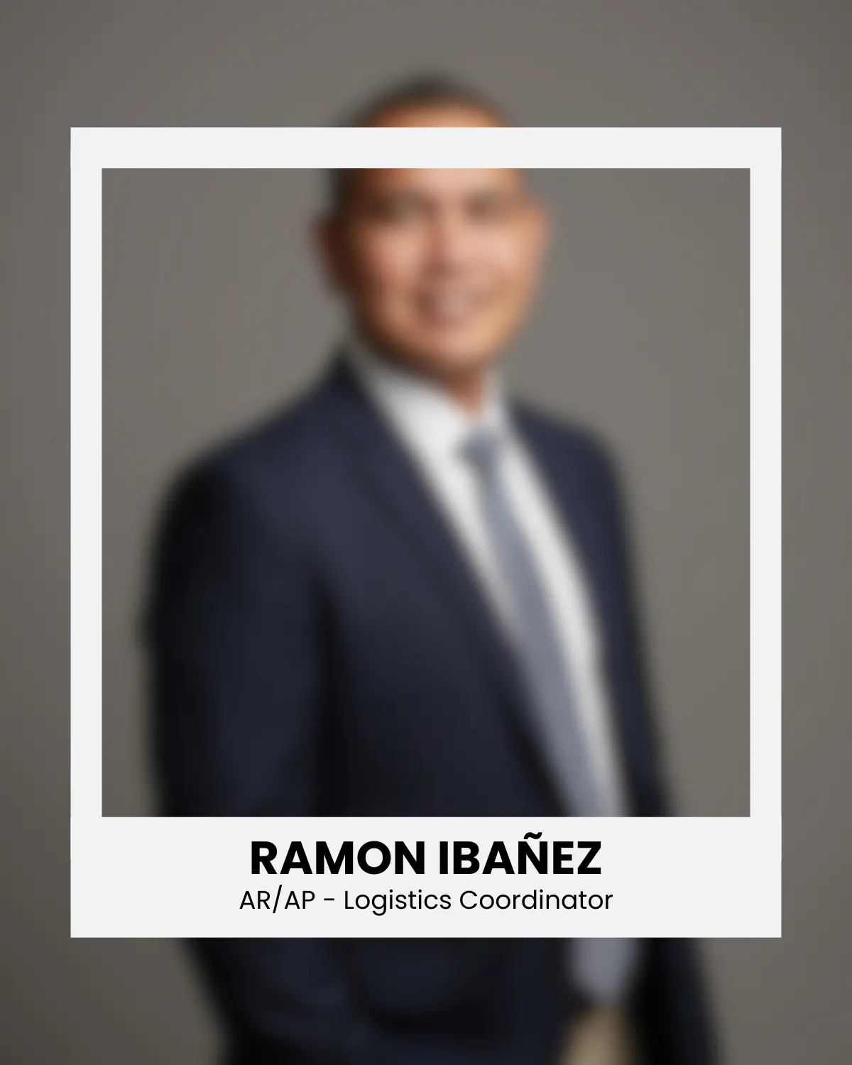 Framed portrait of Ramon Ibañez, AR / AP Logistics Coordinator at Sayed Transport, Canadian trucking company, blurred background