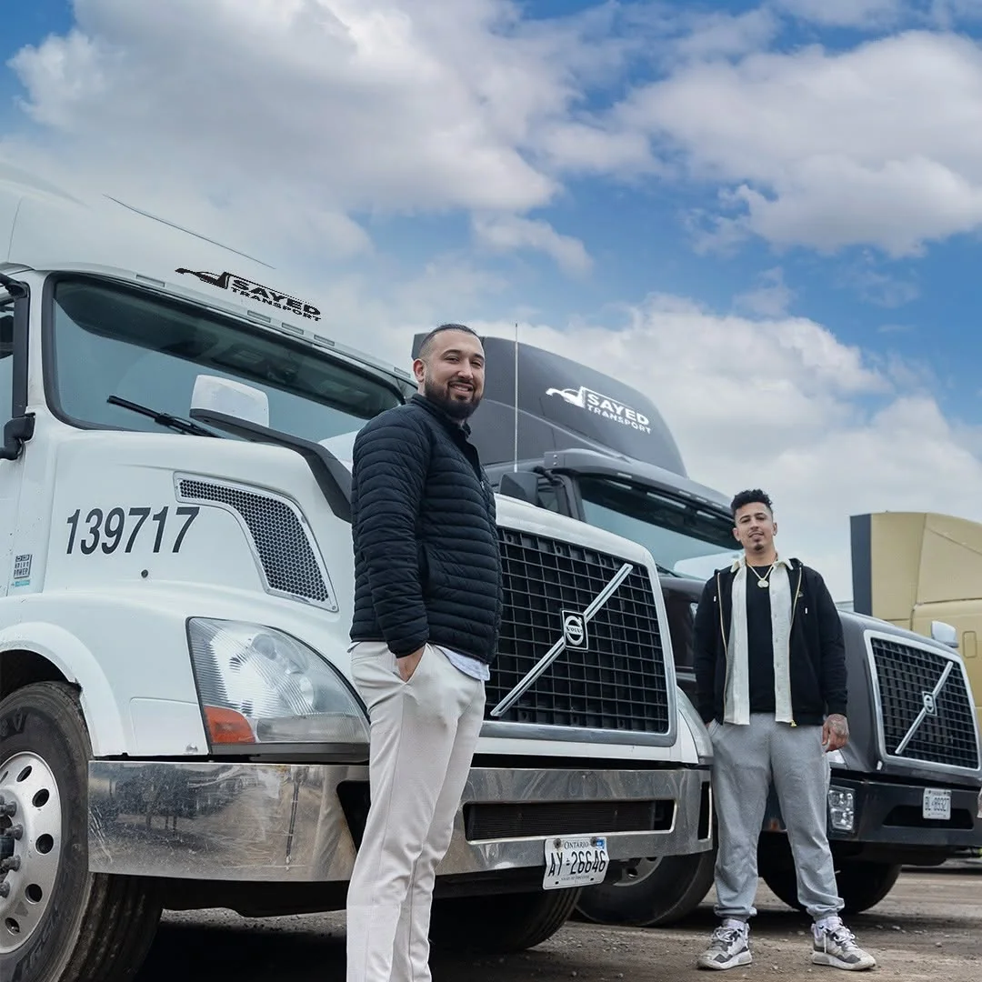 Poyan Sayed and Keyhan Sayed with Sayed Transport trucks - owner-operated trucking company